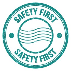 SAFETY FIRST text written on blue round postal stamp sign