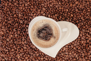 cup of coffee with beans