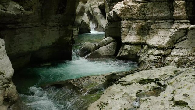 Caucasus. A flight in the Navalishinsky canyon over the Khosta mountain river. Subtropical forest.