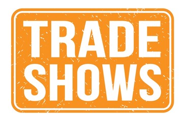 TRADE SHOWS, words on orange rectangle stamp sign