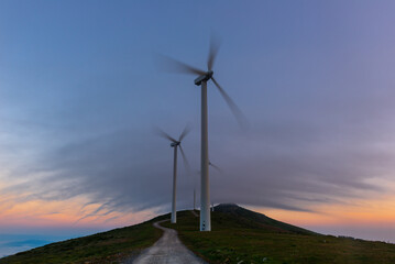 Wind turbines farm at sunrise, Oiz mountain, Basque Country, Spain