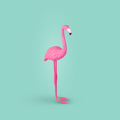 Pink flamingo bird on pastel turquoise background.