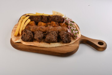 Kebab, traditional Turkish, Greek meat and chickens food, isolated on white background