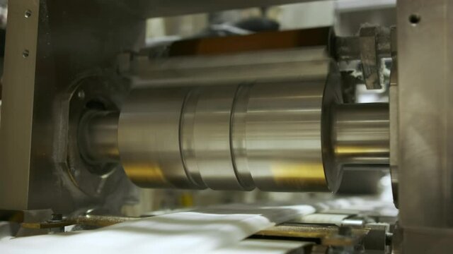 Adding flavored gels, re-pressing, forming the inner layer. An enterprise for the production of diapers.