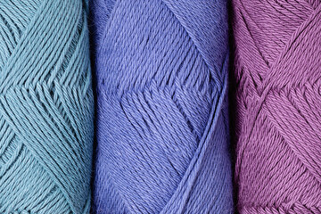 Close up texture of woolen, cotton yarn. Hobby, knitting, diy background