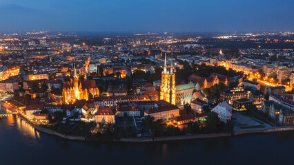 Night panorama of the old European city of Wroclaw from above. A beautiful old town illuminated by bright lights. aerial photography. Wroclaw, Poland