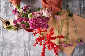 Step by step installation of flowers in a vase. Flowers bunch, set for home. Fresh cut flowers for decoration home. European floral shop. Delivery fresh cut flower.
