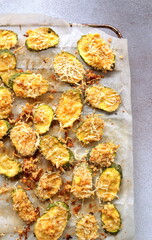 zucchini chips in the oven baked close-up selective focus.