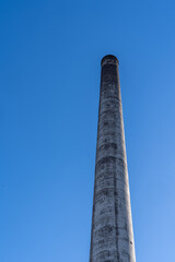 Giant, tall smokestack, a famous landmark in the small town of Gay, Michigan