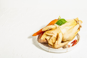 Whole free-range chicken poultry. Organic farm food, trendy hard light, dark shadow