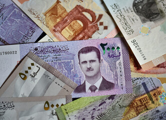 a portrait of bashar al assad, president of siria