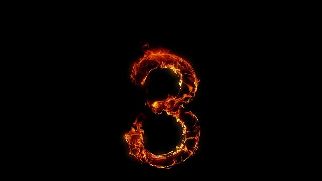 Super Slow Motion Shot of Burning Number 3 Isolated on Black Background at 1000 fps.