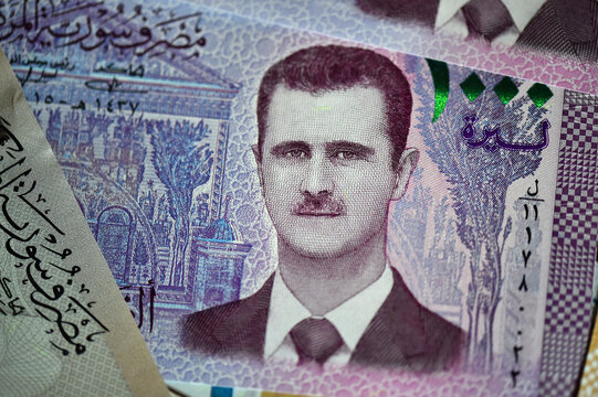 a portrait of bashar al assad, president of siria