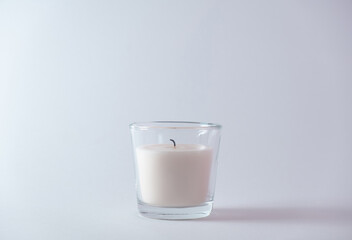 Extinguished candle on a white background. New Year's concept.Copy space