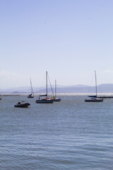 Sea with boats and mountains in the city of Florianópolis