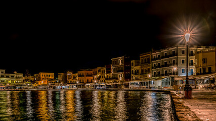 night scenery in the old venetian harbour of Chania with colourful reflections