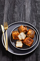 fried pieces of hake on a plate