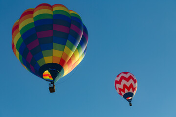 hot air balloon flying high in the Arizona sky 