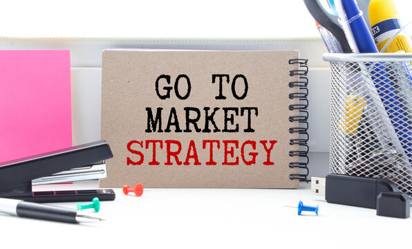 Text GO TO MARKET STRATEGY, Business Success Concept