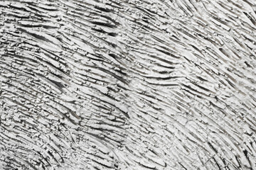Scratches texture. Tile adhesive texture. Facade plaster background. Gray plaster stripes pattern. Home renovation texture. White lines backdrop. Stucco wall background.