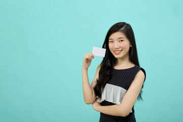 Fototapeta premium Cheerful excited young woman with credit card