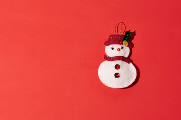 Mexico City, Mexico - November 22, 2021. December holidays. Saint clous, snow monkey, reindeer, rodolph the reindeer, technology gift, a boot and a christmas hat on a red and white background.