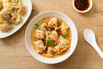 pork wonton soup or pork dumplings soup with roasted chili