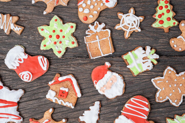 Sweet christmas gingerbread cookies on wooden