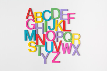 Colorful wooden english letters A-Z on white background