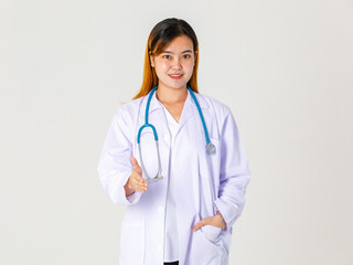 Portrait studio shot of Asian successful professional female clinical doctor in lab coat uniform hanging stethoscope around neck standing smiling  and give hand for shaking