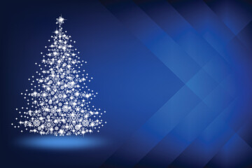 Abstract Christmas tree made of snowflakes and sparks on a blue blank background
