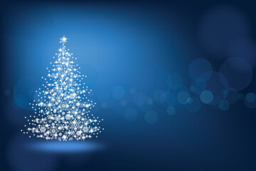Abstract Christmas tree made of snowflakes and sparks on a blue blank background