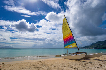 A sailboat on Beau Vallon beach on Mahe island, Seychelles