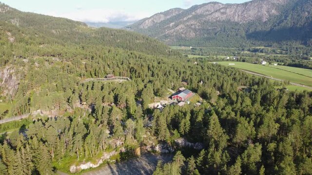 Aerial overview of norwegian zoo and bear park Bjorneparken - High altitude evening aerial showing park area and entrance - Flaa Norway