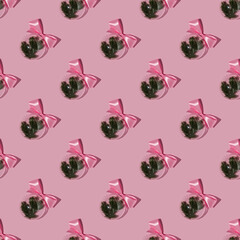 A balloon with a Christmas branch on a pink background. Pattern.