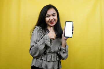 Beautiful young woman with hands holding smartphone with blank or white screen, promoting app, promoting something, cheerful and confident, advertisement, isolated