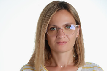 Obraz premium Beautiful blonde middle aged woman wearing glasses for better vision
