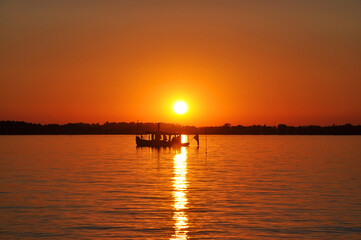 Fototapeta na wymiar Sunset fishing
