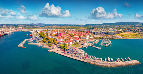 Exciting summer view from flying drone of Koper port. Aerial outdoor scene of Adriatic coastline, Slovenia, Europe. Splendid Mediterranean seascape. Traveling concept background. - obrazy, fototapety, plakaty