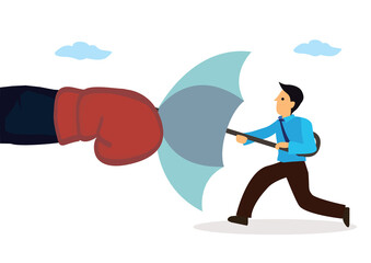 Businessman holding an open umbrella which protects from attacking boxing.