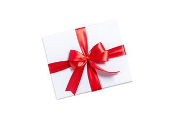 White gift box with red ribbon