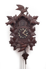 Antique cuckoo clock on white background