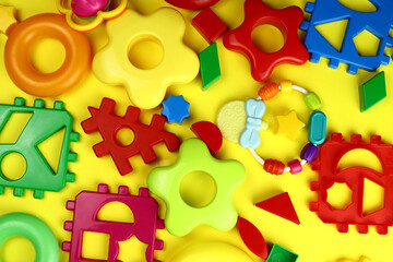 Background of plastic bright children's toys, the concept of educational games