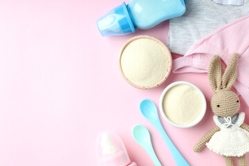 Concept of baby food with рowdered milk on pink background