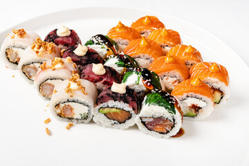 tasty sushi with fresh fish and vegetables