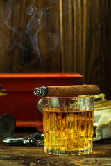 Cuban Cigar on Whisky Glass