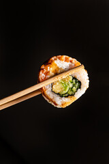tasty sushi with fresh fish and vegetables