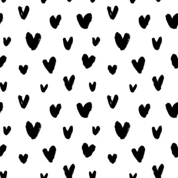 Abstract seamless heart pattern in polka dot style. Hand drawn simple black tiny hearts. Love and romantic theme background. Vector modern grunge ornament for Valentines day and wedding. 