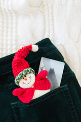 Christmas background top view snowman green jeans