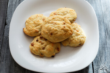 Dessert from cottage cheese with raisins. Cottage cheese pancakes baked in the oven.